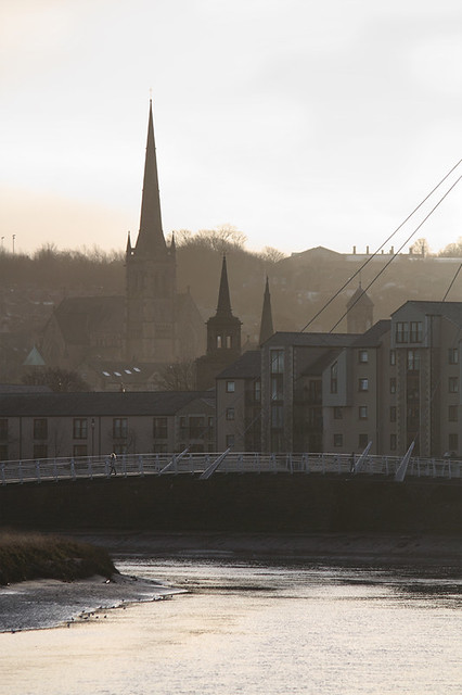 Crossing the Millennium Bridge, Lancaster, Lancashire, UK