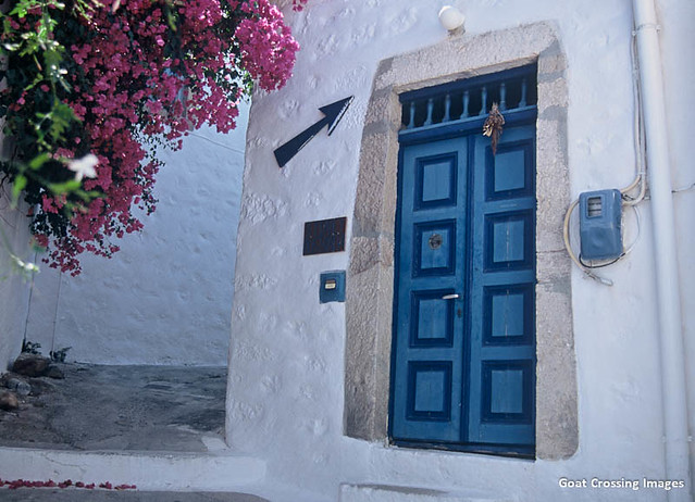 Bougainvillea with blue door - Island of Patmos, Greece