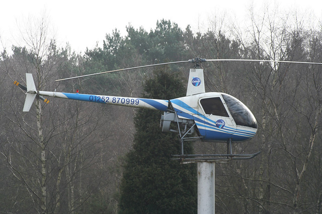 Robinson Helicopter Co Inc Robinson R.22 G-XIIX (Composite)