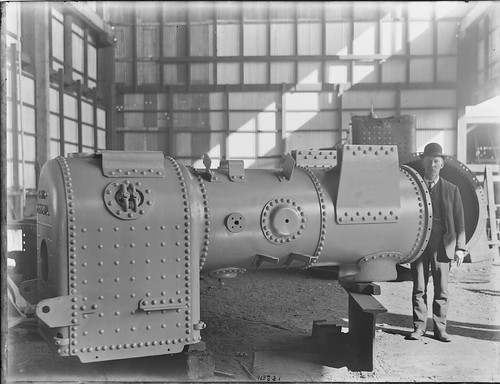 Man with Clyde portable steam engine | by Powerhouse Museum Collection