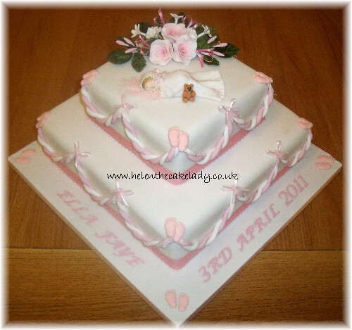 2 tier Christening cake with baby & flowers