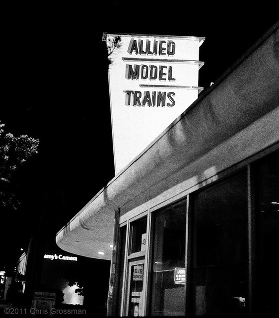 Allied Model Trains Art Deco Sign at Night - Olympus 35SP - TMAX 400 @ 1600