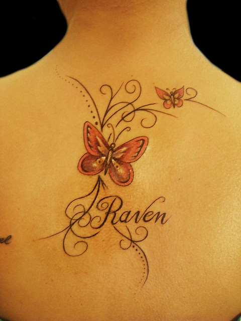 Custom name, patterns and butterfly tattoo