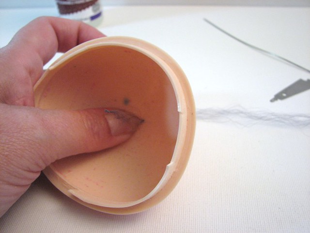 Step 16 - pull the knot against the inside scalp