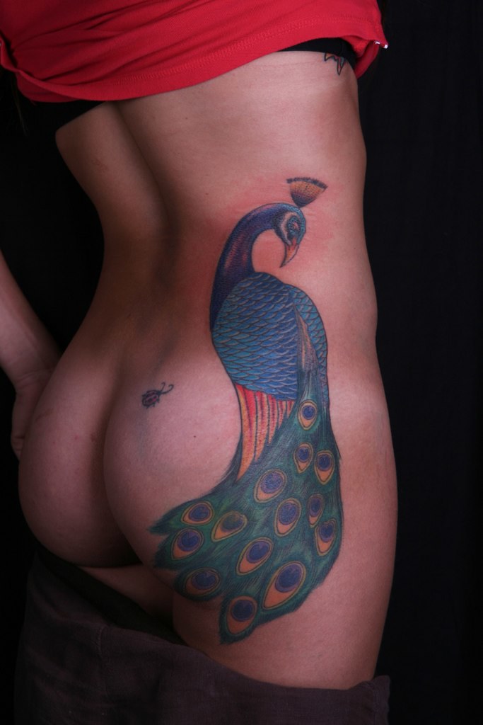 peacock-tattoo-on-back-and-butt | beautiful tattoo design of… | Flickr