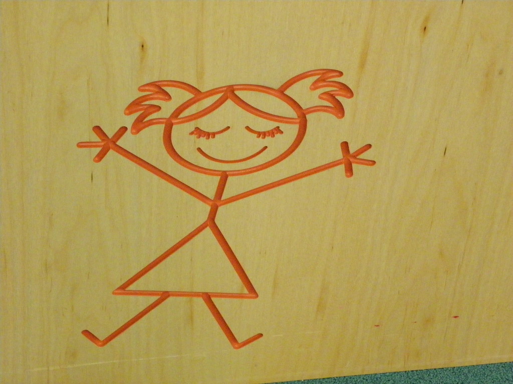 Detail of smiling girl art work in children's area - Herriman Library, Salt Lake County Library Services
