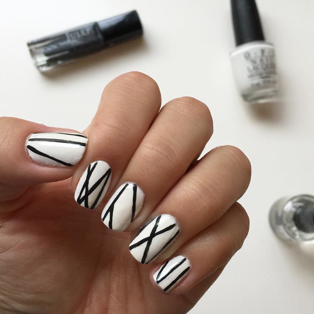 Black lines on white nails | triplyksis | Flickr