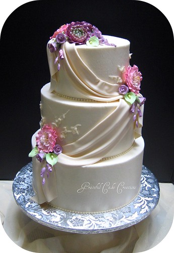 Elegant Ivory Wedding Cake with Fondant Swags | by Graceful Cake Creations