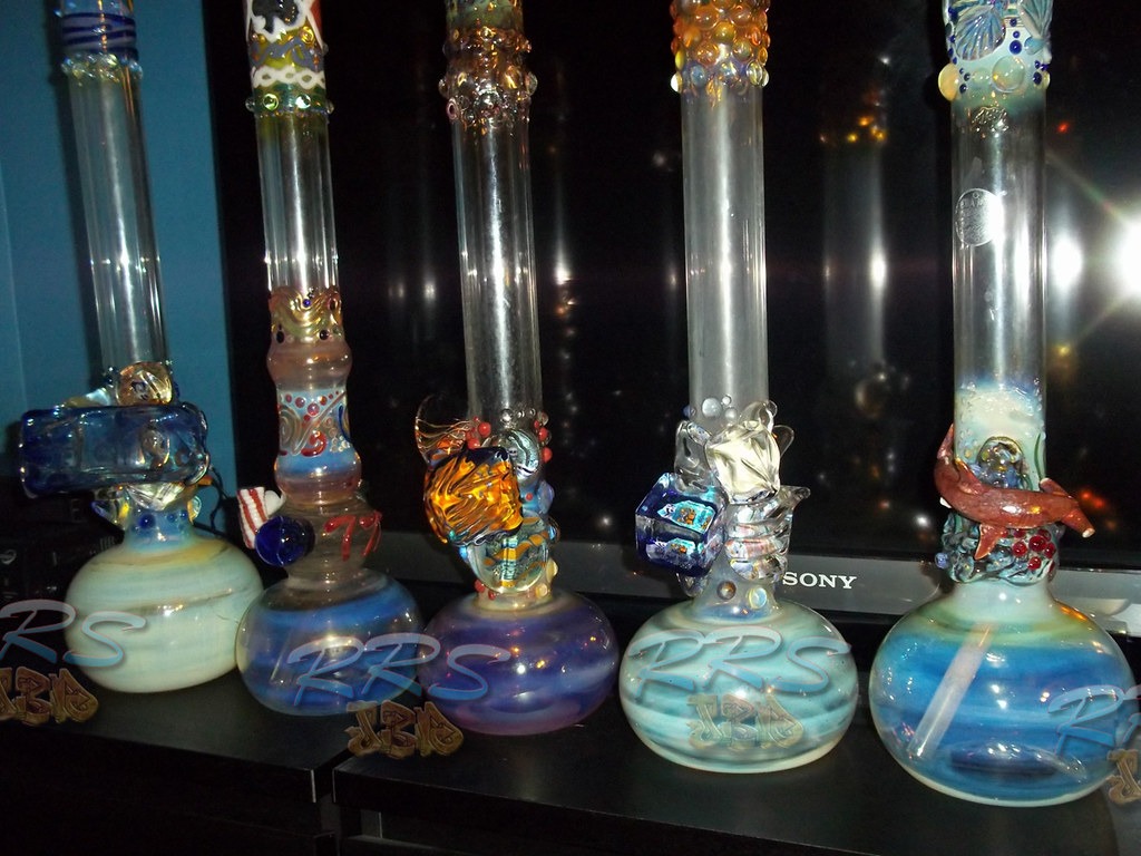 waterpipe bong collection for herb and dank mixed with weed and marijuana.