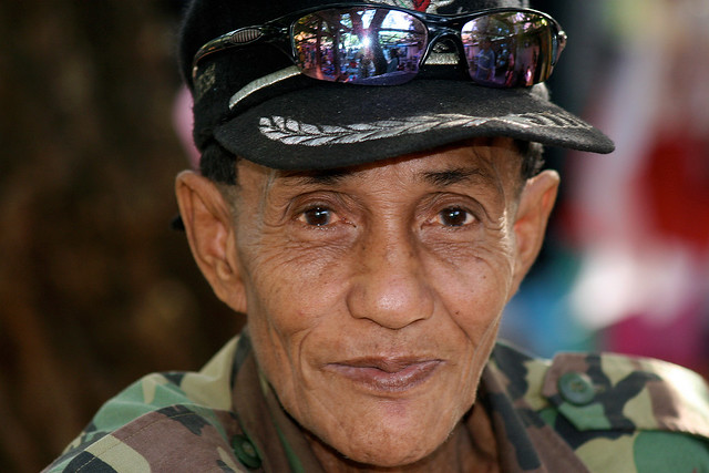 Portrait of a man at a market in Timor, Indonesia.