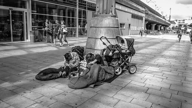 homeless couple with baby carriage