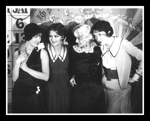 Clara Bow (2nd left) in 'Saturday Night Kid'