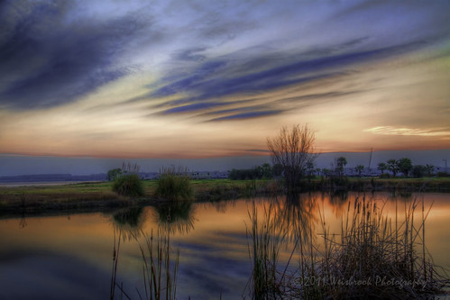park sunset reflection water texas cloudy cattails rv dickinson traveltrailers
