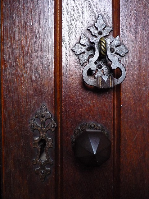 Ancient door knocker, lock and handle on the medieval church of St Mary, Nackington, Kent