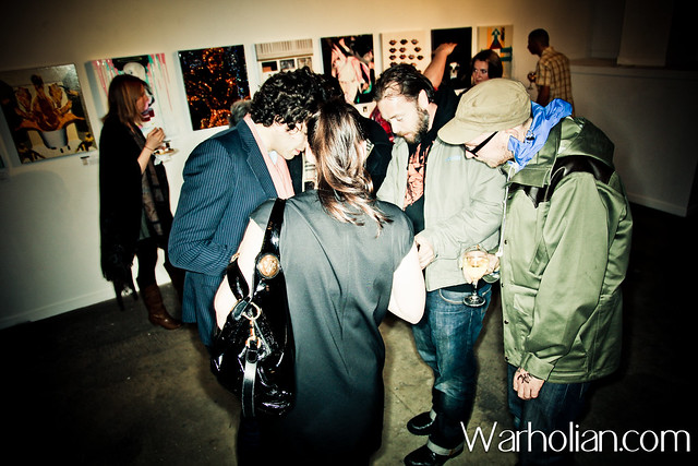 Adam Rozan, Kirsten Skipper, and Ben Eine look at Garrith's photos - Warhol Reimagined: The New Factory Setup and VIP Opening Night - Project One Gallery - Warholian