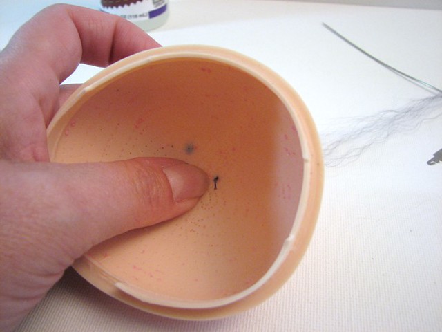 Step 17 - the knot against the inside scalp