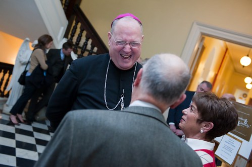 Archbishop Dolan greets guests after Mass
