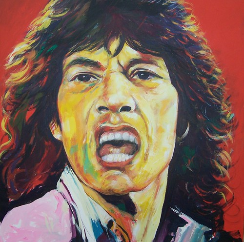 Singer with open mouth against a yellow background