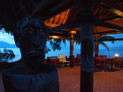 P3027253 by Kent MacElwee, Hanging out by the water at sunset at Carolina Cottages in Tuk-Tuk on Samosir Island on Danau Toba,