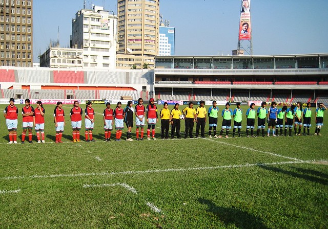 Teams line up ahead of the final match in the women's football tournament