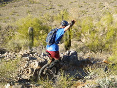 Unicyclist concentrating on Peak 2429 - Phoenix Mountains Preserve