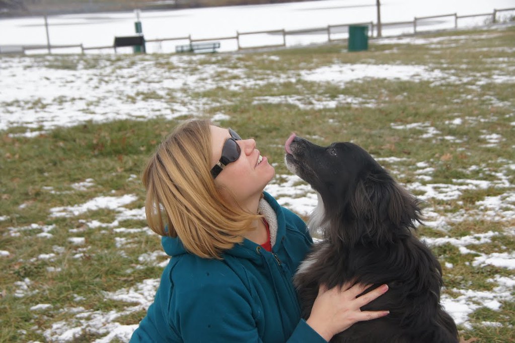 A damsel and a doggie...By the lake and the snow and Ice
