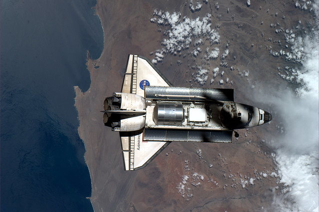 The ISS casts a shadow on Discovery