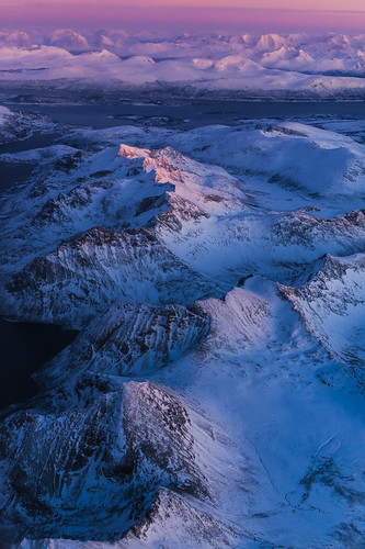 arcticfjord durmålsfjellet kattfjordeidet kvaløya skittentinden storsteinnestinden trehørningen troms tromsøfebruary arctic arcticlight mountains snow summits sun sunset winter