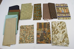 All of these fabrics have green, or green undertones, in them.