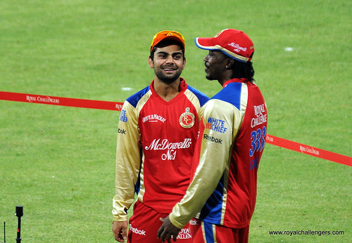 Virat Kohli has a chat with Chris Gayle | Orange cap holder … | Flickr