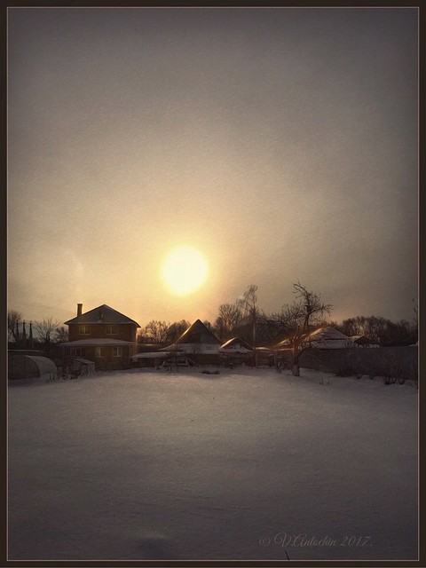 Winter evening in the village.