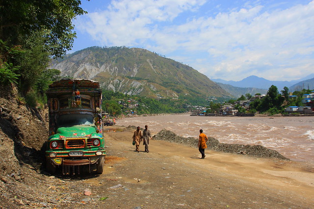 Painted truck parked up next to the Neelum River, Muzaffarabad city, Kashmir