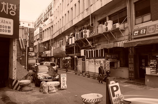 Korea Daegu Jungangno area with lots of signage and brutalist buildings - 