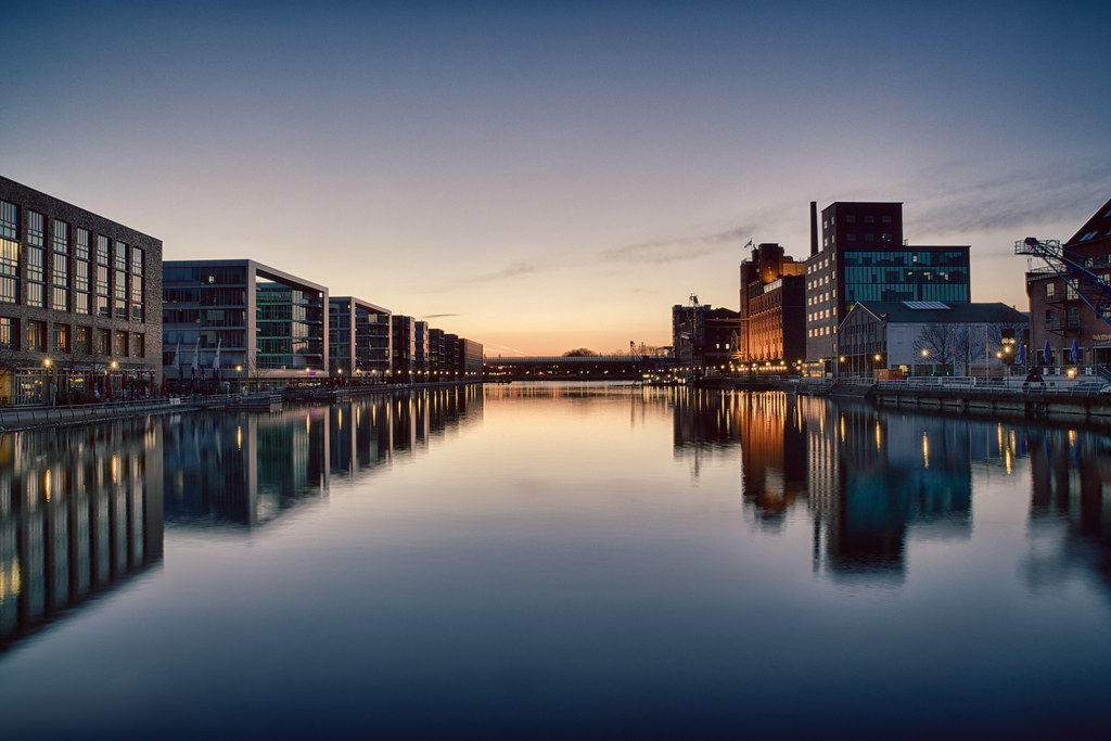 View over the inner harbour in Duisburg at sunrise. 