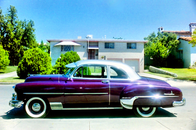 An old car white and purple