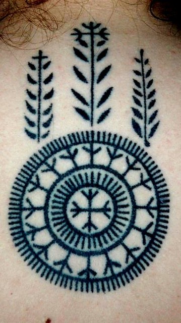 with a traditional Croatian Catholic tattoo from Bosnia and Herzegovina on her back... Hrvatske tradicionalne tetovaze