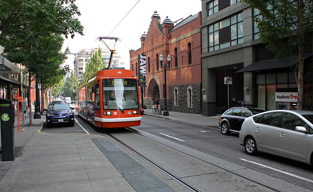 Portland Streetcar #002 on Powell's trip to the Tilikum Crossing bridge.  NW 11th and Couch, Portland Oregon, July 9 2015.