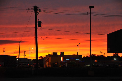 Dos Reales Sunset by HorsePunchKid, A vivid sunset over North Prospect in Champaign, Illinois