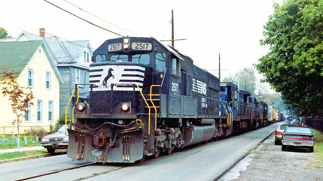 Norfolk Southern: 2517 EMD SD70 leading a merchandise freight along 19th Street, Erie, PA