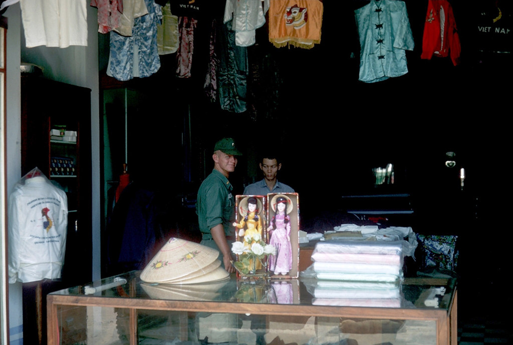 Vietnam 1965 - Photo by Ted Yates - Lt. John Coggin shopping in An Khe
