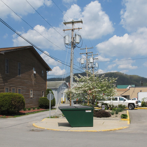 2015 20150506 2ndstreet img8638 may may2015 pantherlane parsons parsonswestvirginia secondstreet tuckercounty tuckercountywestvirginia westvirginia brownsiding curbs cylindricaltransformers distanthillside dogwood dogwoodtree downtown downtownparsons dumpster easternwestvirginia electriclines electricpoles flowerbeds floweringtree greendumpster kerbs landscaping landscapingplants northernwestvirginia overheadelectriclines overheadpowerlines parking parkinglot partlycloudy paved pavement polemountedtransformers powerlines siding springflowers stopsign telephonepoles transformers utilitypoles whitefloweringtree whiteflowers woodsiding woodensiding yellowcurbs unitedstates