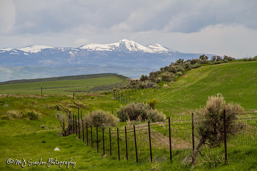 wide open space scenic idaho mountains clouds cloudy green rolling hills scanlon canon 7d