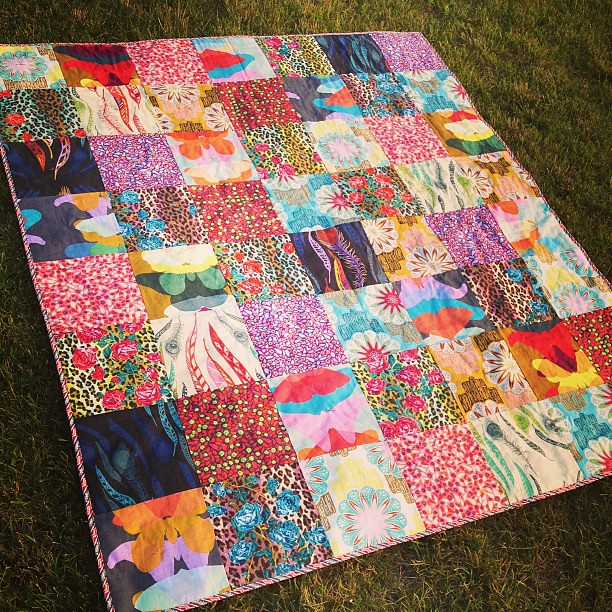 My first hand-tied quilt! This AMH awesomeness will live in our car and be our picnic/anywhere quilt. #amhismyhomegirl #quilt