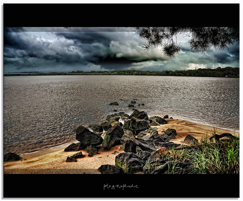 bridge storm beach water rain river sand nikon rocks ominous threatening darkclouds d90 colorphotoaward fotografdude
