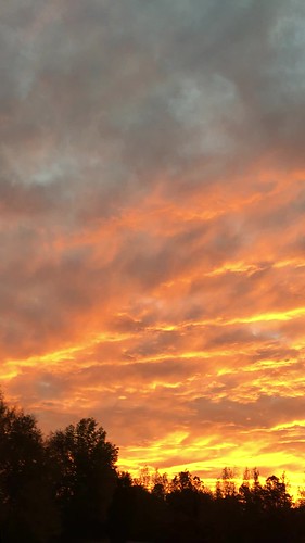 sunrise orange yellow blue sky clouds
