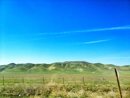 blue sky green fence i5 hills