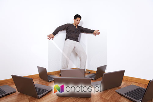 Man fearing laptop computers