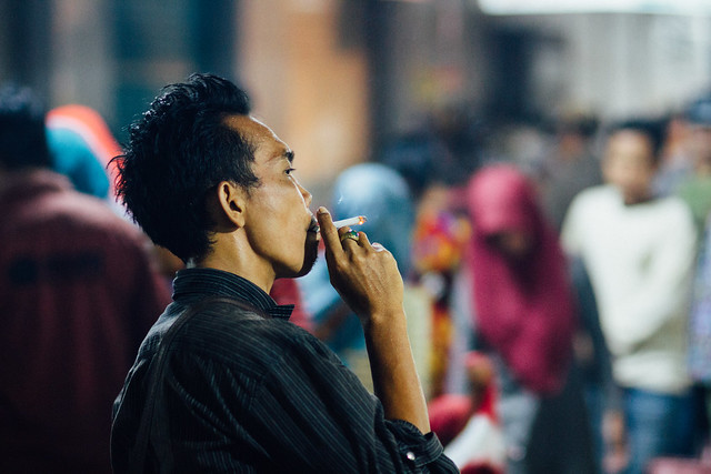 Smoking Cigarette at Night Market, Buleleng Indonesia