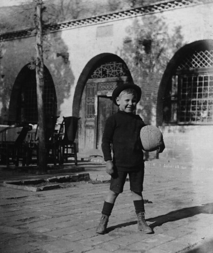 山西窑洞外面的小足球队员 1920s Little Football Player in China