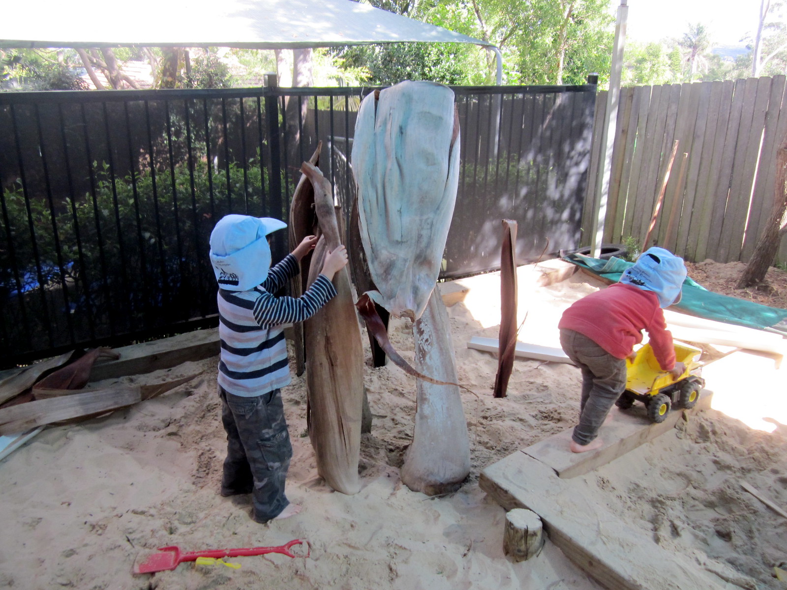 building a cubby in the sand pit